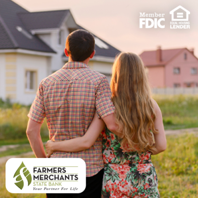 Woman and Man looking at a house