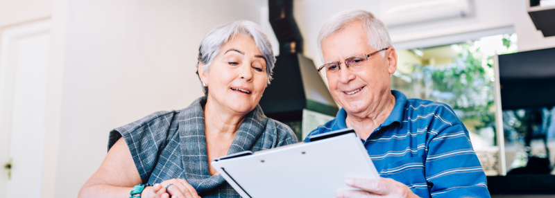 Homeowners reviewing downsizing plans and financial considerations